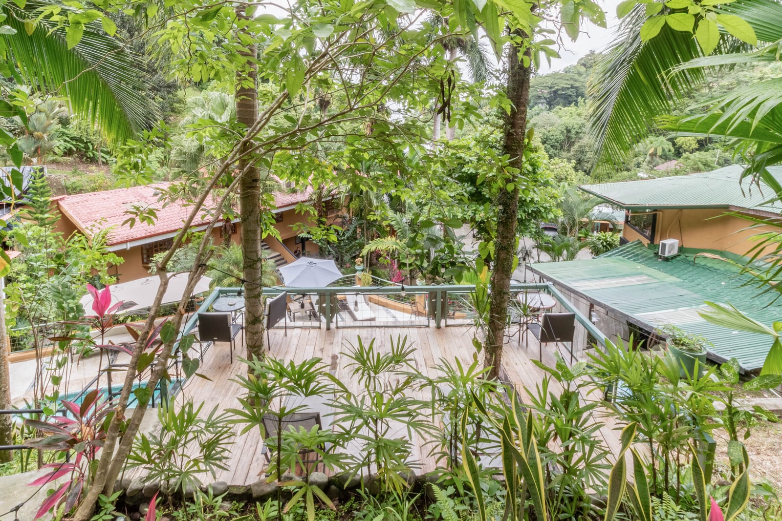 The upper deck looking down over the pool and the gardens