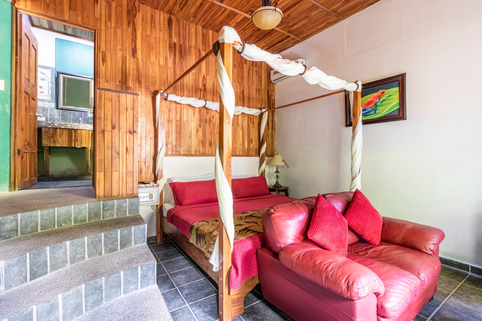 Garden View Room with king canopy bed and easy garden access at Boutique Hotel Las Cascadas