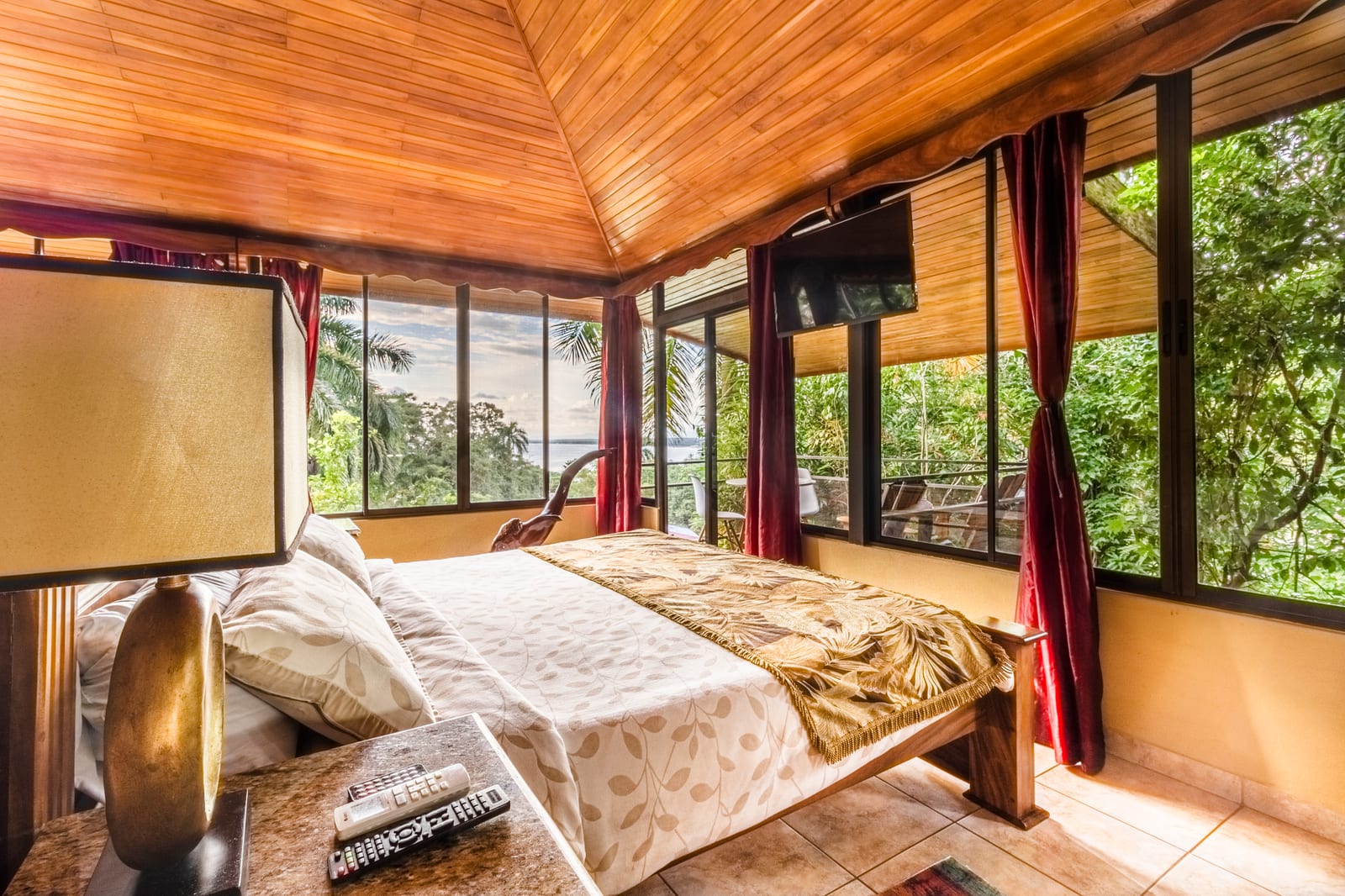 Toucan Suite penthouse with ocean views, king bed, and full kitchen
